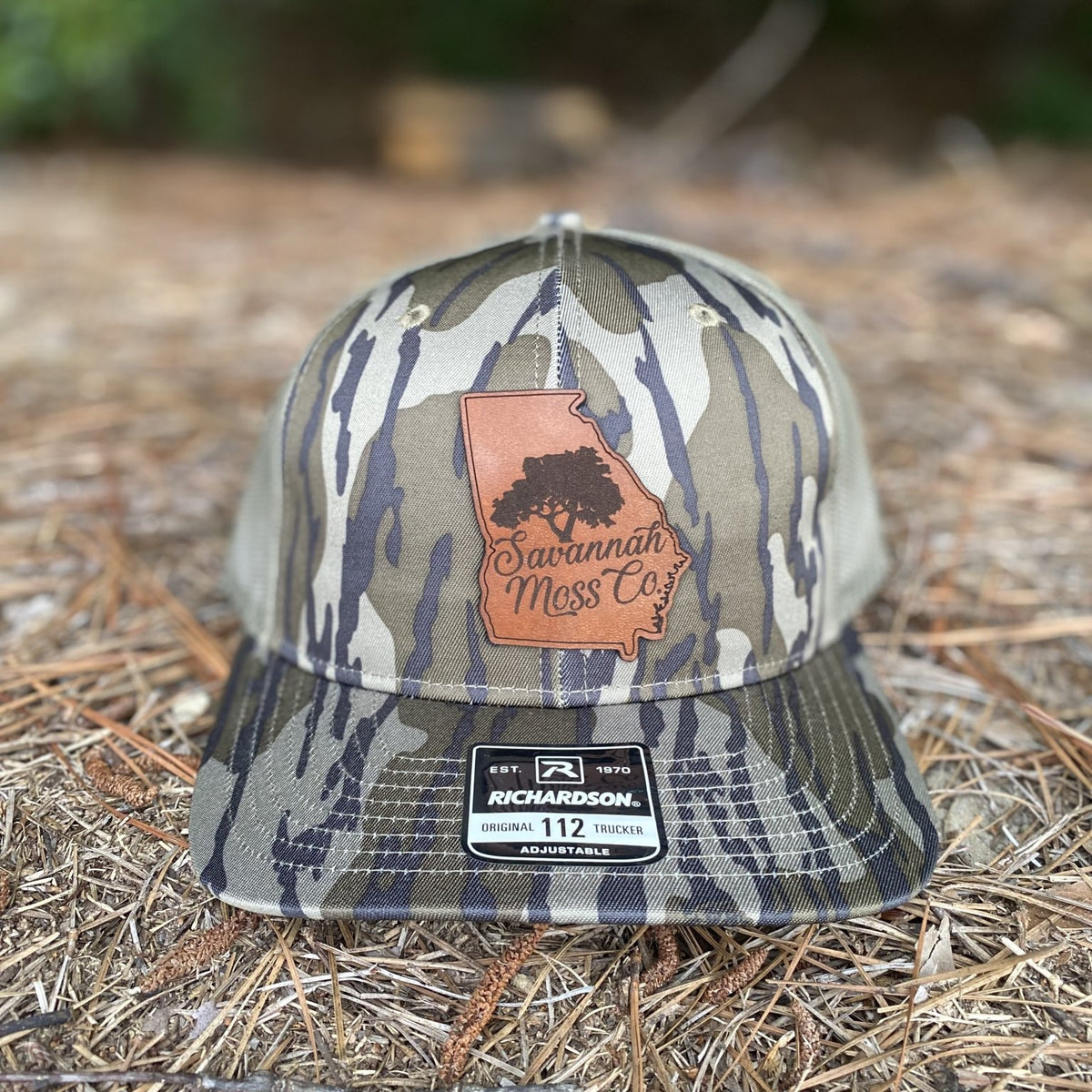 [12 Pack] Leather Patch Camo Hats - Custom Shape Patch - Mossy Oak  Bottomland / Rawhide
